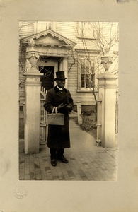 Caterer Edward Cassell standing in front of the Nichols House, Salem, Mass., ca. 1907