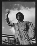 Tennessee Valley Authority. Construction of Douglas Dam. Negro worker at the TVA's new Douglas Dam on the French Broad River. This dam will be 161 feet high and 1,682 feet long, with a 31,600 acre reservoir area extending forty-three miles upstream. With a useful storage capacity of approximately 1,330,000 acre-feet this reservoir will make possible the addition of nearly 100,000 kilowatts of continuous power to the TVA system in dry years and almost 170,000 kilowatts in the average year