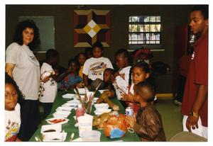 Children at a Table with Craft Supplies