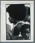 Young girl with white ribbon in hair