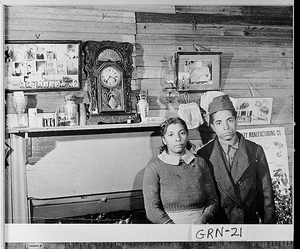 Photograph of two African-Americans sitting in their home, Greene County, Georgia, 1941 Nov.