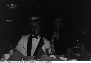 Photograph of an unidentified man and woman dressed in formal attire