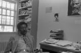 Thumbnail for John Blassingame: New York. John Blassingame seated in office, Fredrick Douglas portrait on the wall (BLJP 1-79 #101)