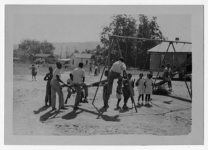 Thumbnail for Photograph of African American students playing on a playground, Manchester, Georgia, 1953