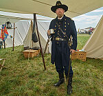 Costumed character Gary Carlberg at the re-enactment, held each American Independence Day Weekend (on and surrounding July 4), of various skirmishes at the decisive 1863 Battle of Gettysburg, in Pennsylvania, which turned the tide of the American Civil War against the outmanned, rebellious Confederates for good. Mr. Carlberg, a retired Army reservist from White Bear Lake, Minnesota, who works at the Pentagon outside Washington, depicts Col. William Colvill of the Union Army's 1st Minnesota Infantry Regiment at the battle