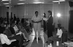 Miss Black California participants preparing with instructors, Los Angeles, 1989