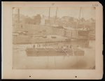 [Military construction in northern Virginia: man rowing raft of blanket boats on the Potomac River]