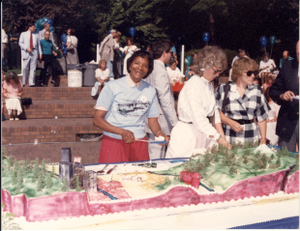 Gladys McCoy cuts the cake