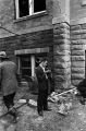 Photographer standing outside of 16th Street Baptist Church in Birmingham, Alabama, after the building was bombed.