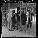 Long Beach Polytechnic High School student being searched for weapons at gate of school in Long Beach, Calif., 1969