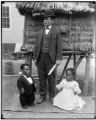 Juan de la Cruz and Mirtina de la Cruz with Mr. Evans at the 1904 Philippine Exposition