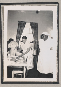 Photograph of three African American women cooking in a kitchen, Clarkesville, Habersham County, Georgia, 1950