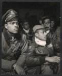 [Members of the 332nd Fighter Group attending a briefing in Ramitelli, Italy, March, 1945]