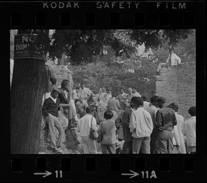 View of speakers, most likely Black community leaders or activists, at Black student rally in Franklin Park