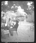 [Uncle Billy McCrea (right), with John A. Lomax (center), and friends, at Billy's home in Jasper, Texas]