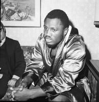 Frazier, Joe; Boxer . With Joe Louis & Lou Handler.