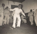 Sergeant "Pork Chops" Listerine dancing at the African American USO Club in Anniston, Alabama.