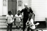 Rev. Begay, S.S.J., and Boys, St. Joseph's Church, Welsh, Louisiana, 1981