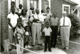 Group Portrait of New Converts and Rev. Stauble, O. F. M., St. John the Baptist Friary, Lake Village, Arkansas, 1953