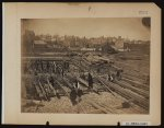 Track near the Potomac River, in Alexandria. Lumber; part of construction force at work, &amp;c