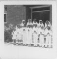 First communion group on stairs