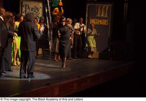 Curtis King, Erykah Badu, and Dereque Whiturs on Stage with Performers