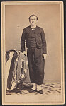 [Second Lieutenant Emil Beese of Co. C, 9th New York Infantry Regiment and Cos. I and C, 12th New York Cavalry Regiment in zouave uniform, with American flag]