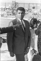 Muhammad Ali on the football field with the mascot and cheerleaders from Tuskegee Institute during homecoming activities for Alabama State College on Thanksgiving Day in Montgomery, Alabama.