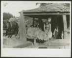 Two women stringing tobacco, boy, sharecopper family near Manning, S.C.