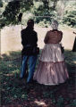 African American man and woman in Civil War era garb.