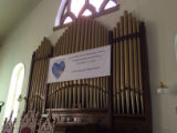 Pipe Organ with Sign