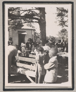 Thumbnail for Photograph of African American families eating a picnic lunch at a gathering held at Mount Pleasant Baptist Church, Clarkesville, Habersham County, Georgia, 1950