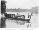 Mrs. Harris canoeing on the Aruwimi, Upper Congo