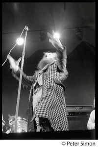 Ian Anderson (Jethro Tull) in performance, exhorting the audience, Newport Jazz Festival