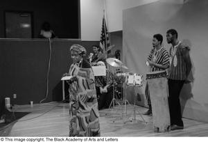 Photograph of unidentified woman and the band