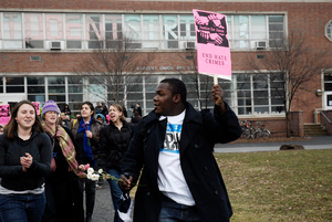 Justice for Jason rally at UMass Amherst: protesters marching from the Student Union Building in support of Jason Vassell