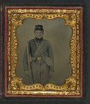 [Unidentified soldier in Union uniform with bayoneted musket, cap box, and canteen]