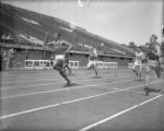 Sprinter Ralph Metcalfe wins 100-yard dash at NCAA meet, 1932