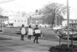 John Davis and Mike Bibler of SCLC, picketing with a young woman in front of the Barbour County courthouse in Eufaula, Alabama.