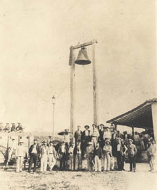 E. Atkins & Co. employees under the old slave bell, Soledad, Cuba