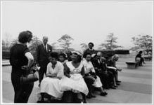 Little Rock Nine students sitting in a courtyard, New York, NY, 1958