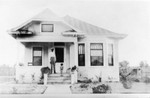 Man and child on front porch