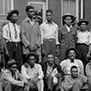 Group of African American men in front of the County Clerk's office