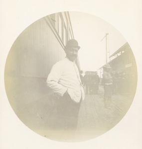 Railroad Employee on Train Platform II, ca. 1893.