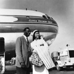 Thumbnail for Nat King Cole and woman at airplane