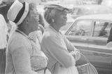 Two women at a political rally, probably in Tuskegee, Alabama.