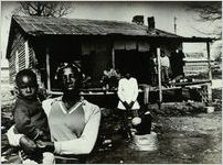 Atlanta Substandard Housing, Poor Family Outside of Shack, April 25, 1971