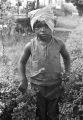 Little girl standing in a yard in Little Korea, a neighborhood in Birmingham, Alabama.