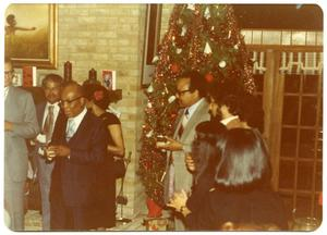 Party-Goers Around ChristmasTree