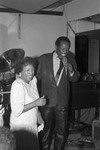 Lou Rawls performing at the Pied Piper nightclub with his mother, Los Angeles, 1989